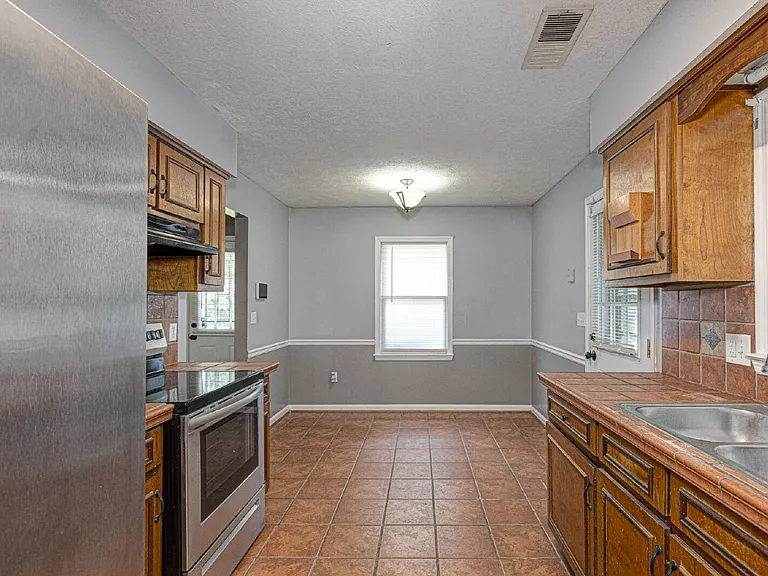 6913 Dorsey Dr — Photo 17