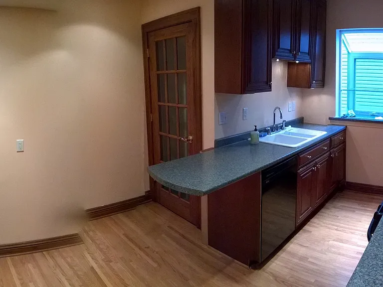 Kitchen view north/east with garden window at east side