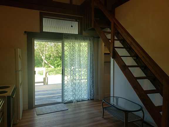 Kitchen with Stairs to Loft
