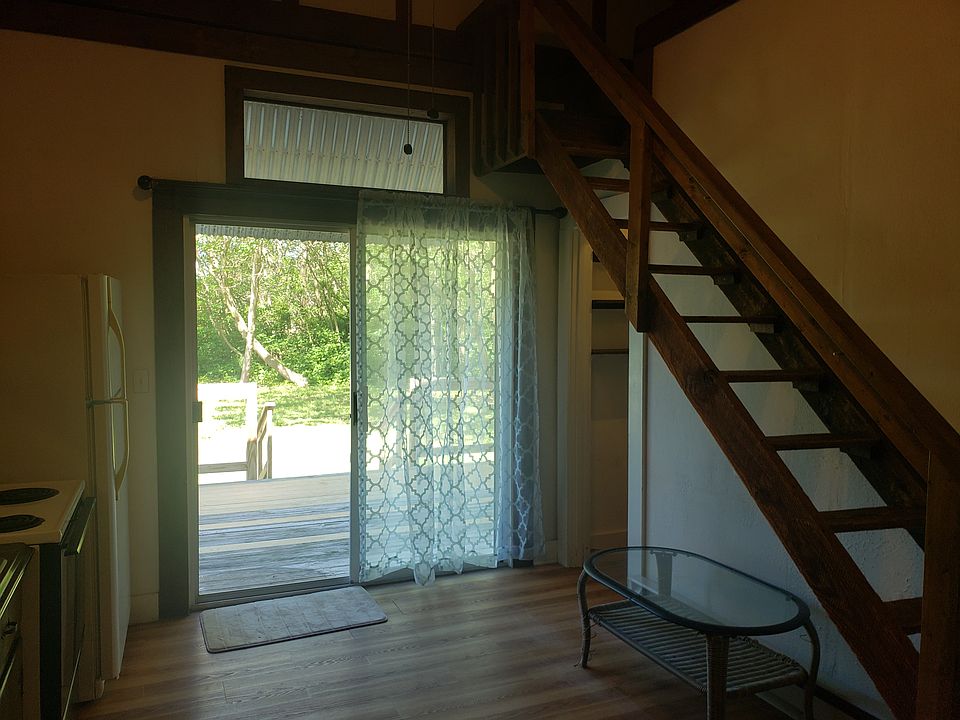 Kitchen with Stairs to Loft