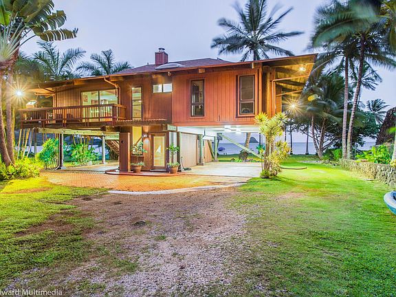 Front view of house; Entry way. 2 carports