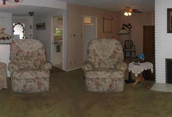 The living room has a nice fireplace and sliding doors to the patio.