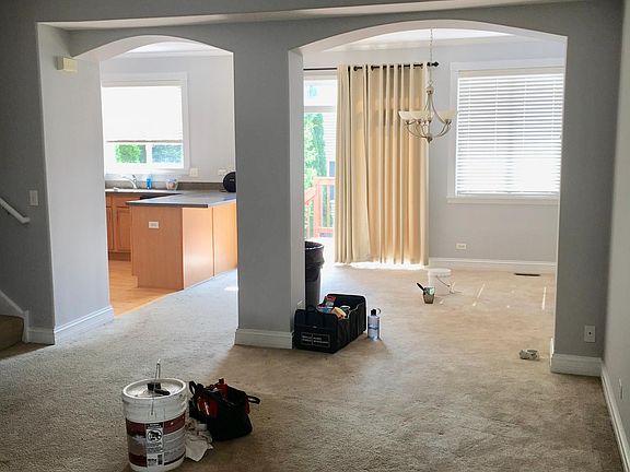 main floor living room, dining room and kitchen ( all carpet