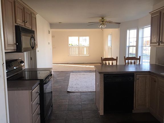 open kitchen, dining area and living room