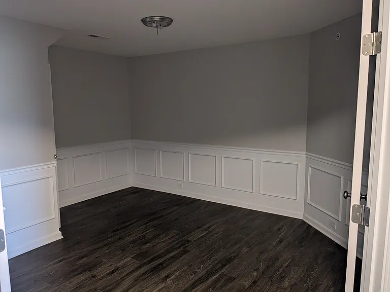 Office with closet. French doors with frosted glass for privacy.