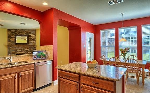 Note: Open view to great room.. island.. and breakfast area overlooking the yard.