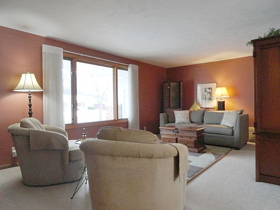 The 12 ft. by 20 ft. living room has quite a large picture window, allowing for lots of natural light in this very spacious room!