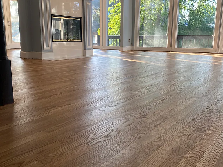 Professionally renovated wooden floors.