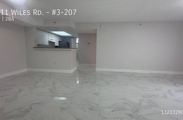 5011 Wiles Rd #3-207 — Photo 29