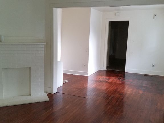 large den looking toward dining room