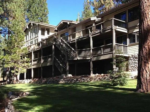 Decks and large landscaped yard.