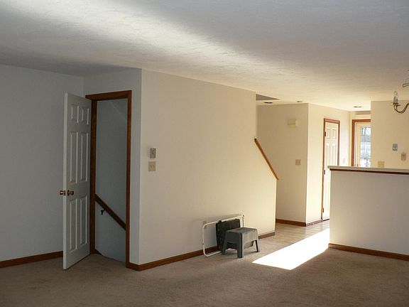 door to stairs from living room to finished lower level