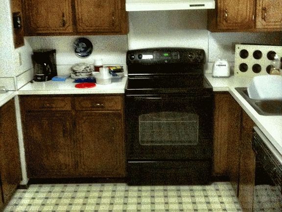 kitchen;newer stove. Refrigerator and microwave