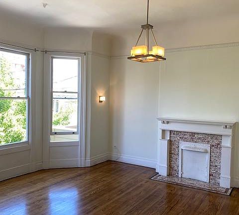 Large sunny living room facing Tennessee Street --one of the widest streets in SF!
