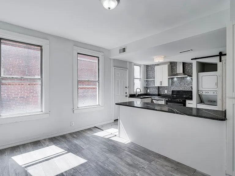 The first-floor windows have been replaced with brand-new, energy-efficient windows.
