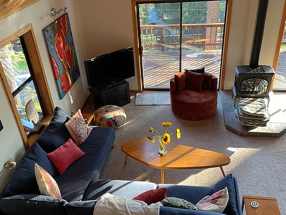 Looking down on the living room from the loft