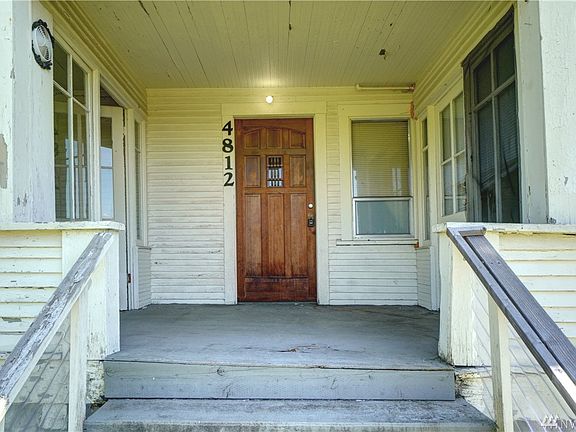 A large covered front porch to greet your guests. 