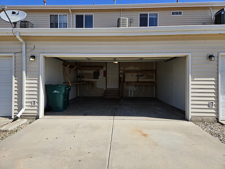2 car garage with shelves