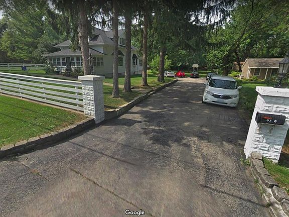 Driveway has room for 7 cars.