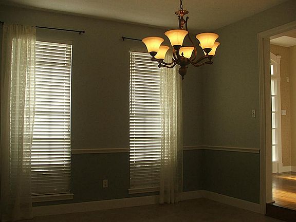 13x12 Dining Room photo taken from kitchen hallway.  Room size is approx