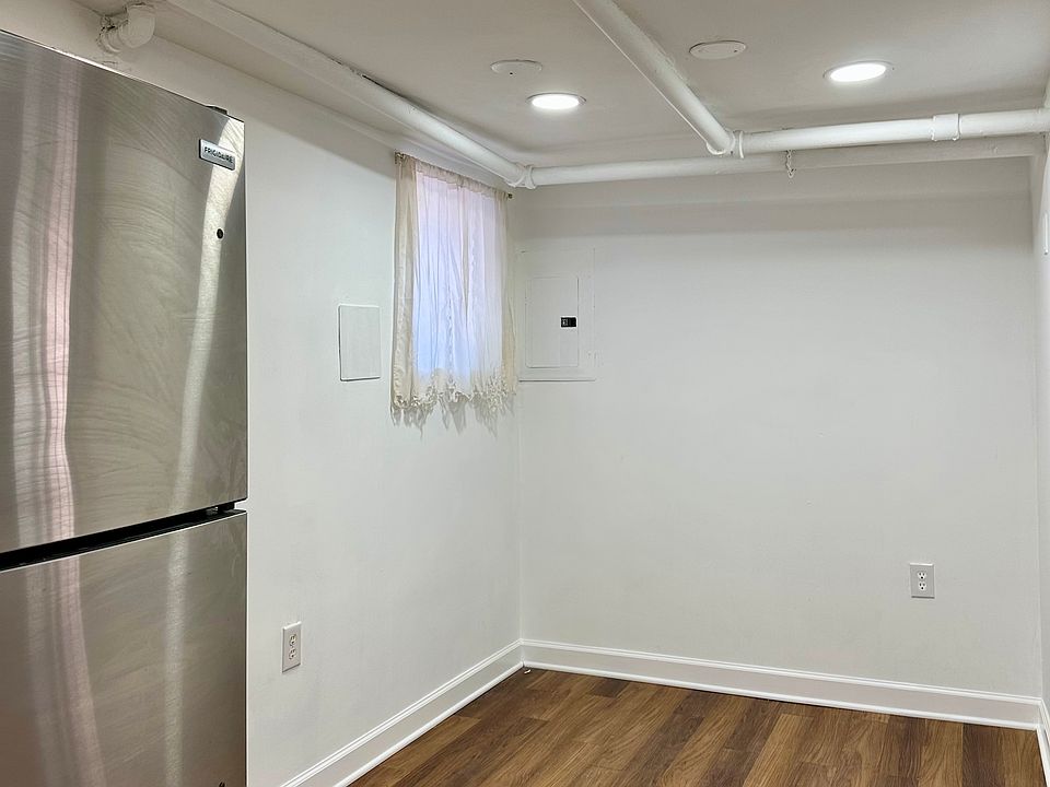 Bright open living space with hardwood floors