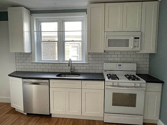 Kitchen from front door of unit