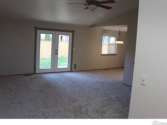 French Style Doors to rear patio and fenced yard.