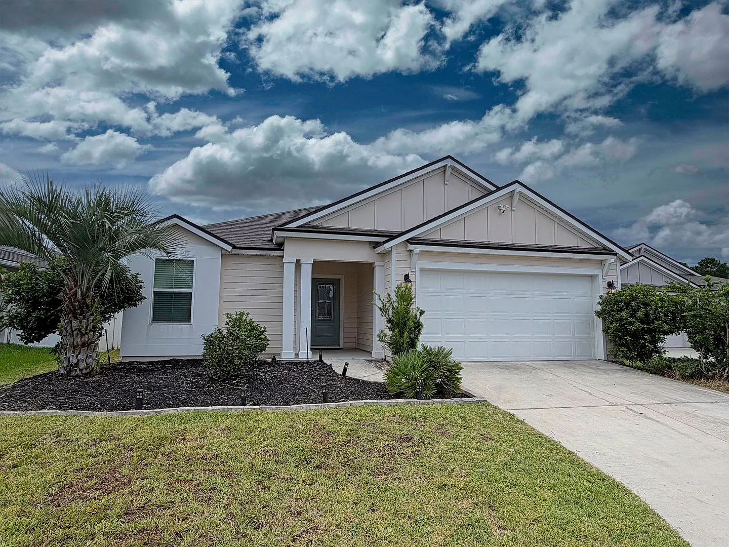 Spacious 4-bedroom, 2-bathroom home featuring an open-concept floor plan and a comfortable, moder... — Photo 1