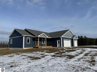 5673 Timber Flats Dr, Kingsley, MI 49649