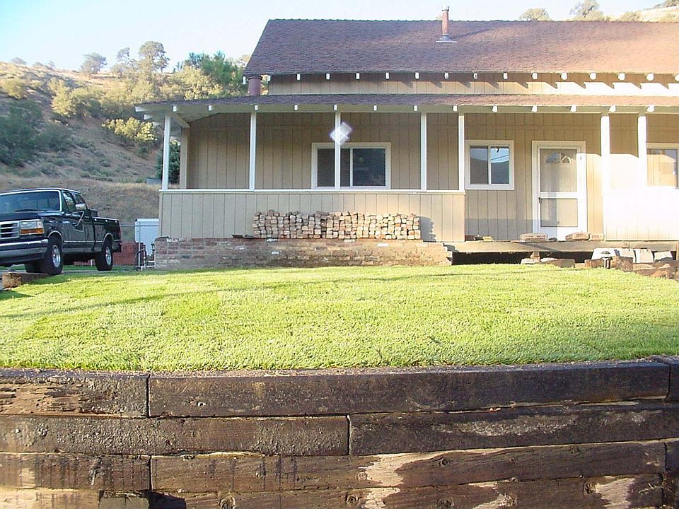 Front of Farmhouse.  Shutters have been added to the windows.  