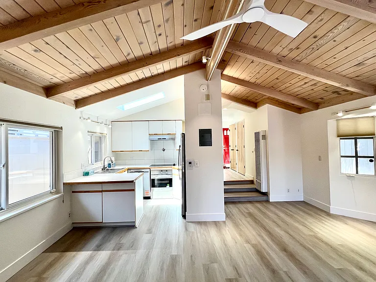 view from slider back into kitchen and hallway