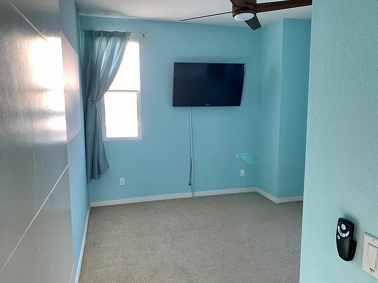 3rd floor guest bedroom (mounted TV included)