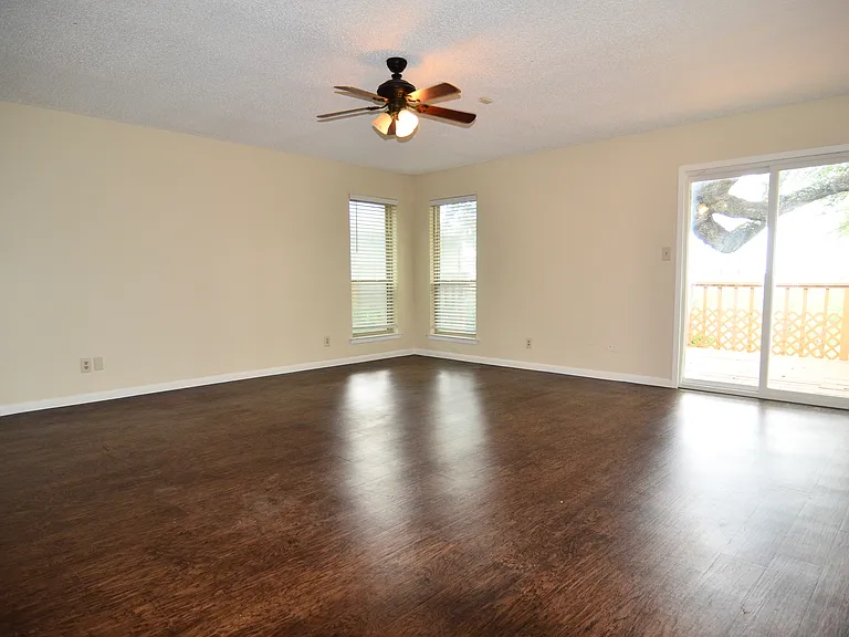 Large master bedroom with access to patio