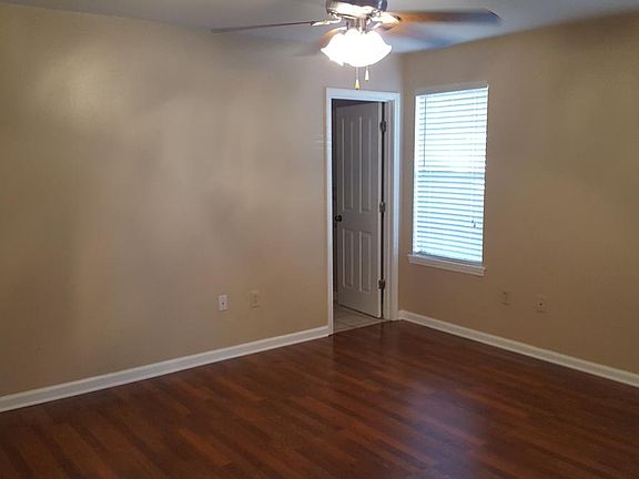 Master bedroom looking towards bathroom on right and walk in closet on left.