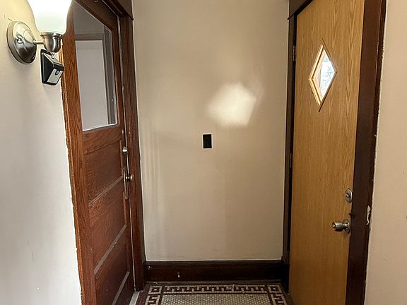Front door to the right, apartment door to the left