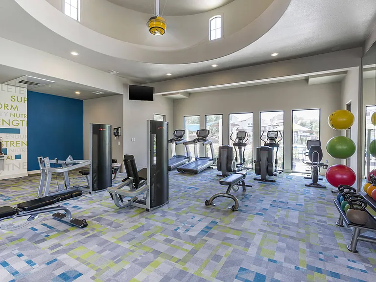 Energize in our roomy fitness center equipped with treadmills and diverse exercise gear