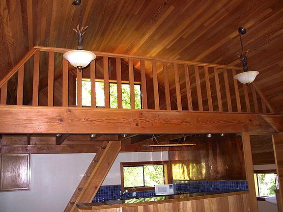 Loft above kitchen and bathroom.
