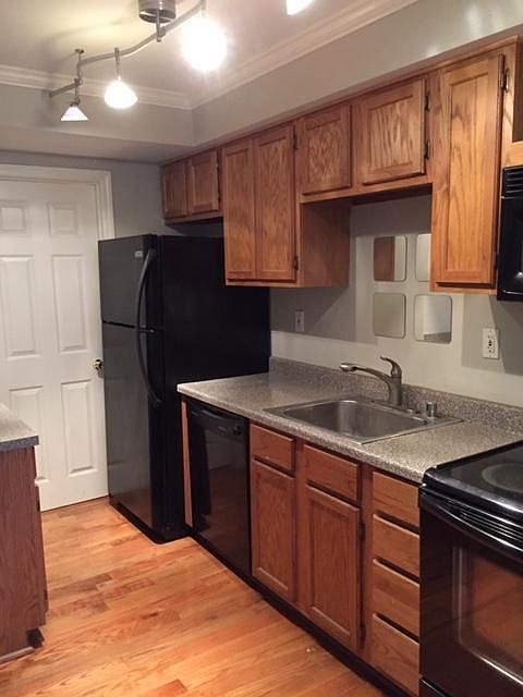 Fully equipped kitchen which includes refrigerator, dishwasher, stove and microwave.