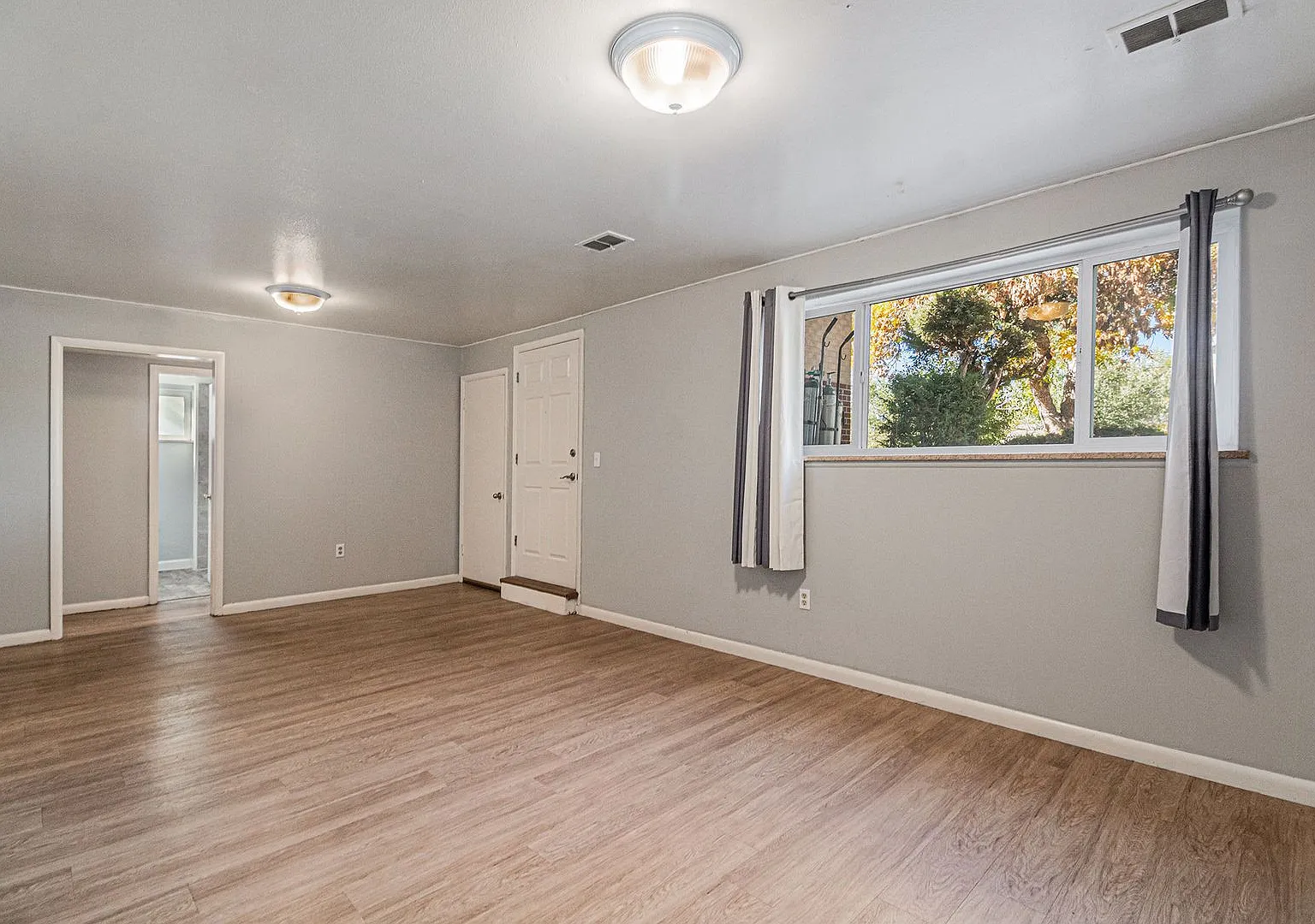 Spacious 2-Bedroom Garden-Level Apartment with Garage & In-Unit Laundry — Photo 2