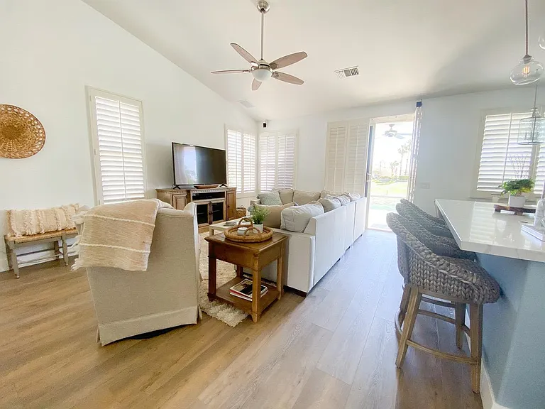 View of great room looking toward the pool and golf course