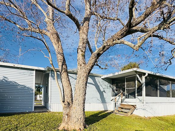 Back of the House with covered Patio