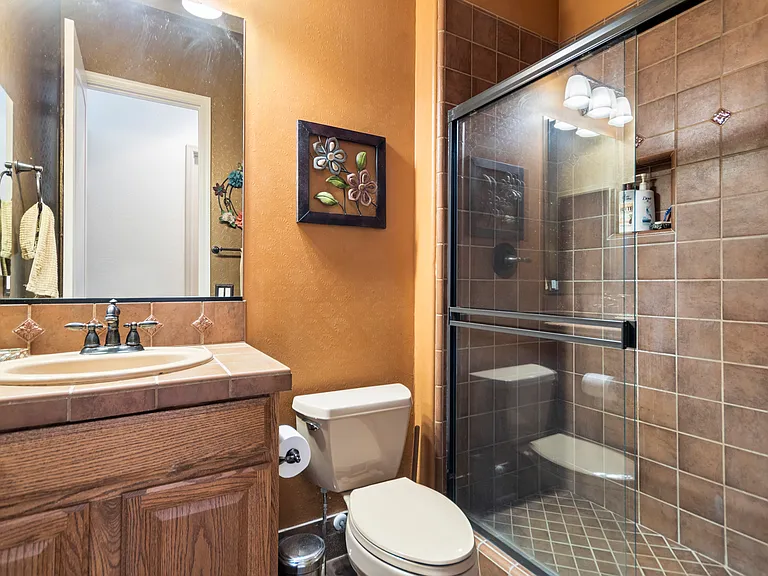Full bathroom downstairs. Great for guets who come over to swim!