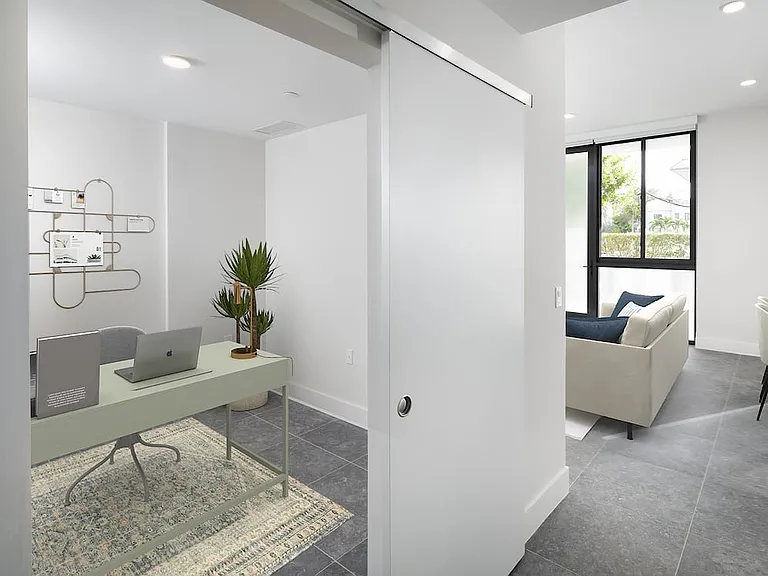 Signature Collection Townhome den with sliding barn door