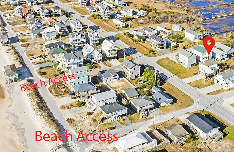 2 beach access right across the street. 55 second walk to the beach. Beautiful wide open beaches with light crowds since there is no public parking near us