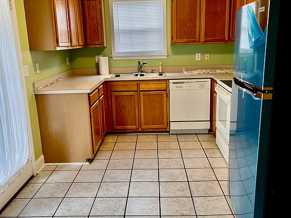 Lot of Cabinets in this Kitchen.
New Stainless Refrigerator!