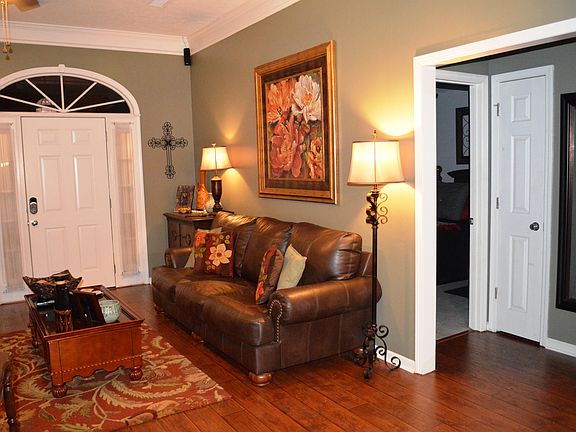 Den and Hallway to Guest Rooms