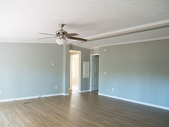 Living room facing main bath and 2 bedrooms
