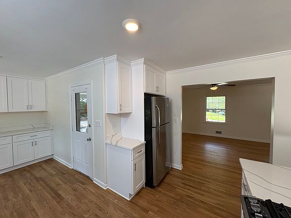 kitchen looking into dining room or den