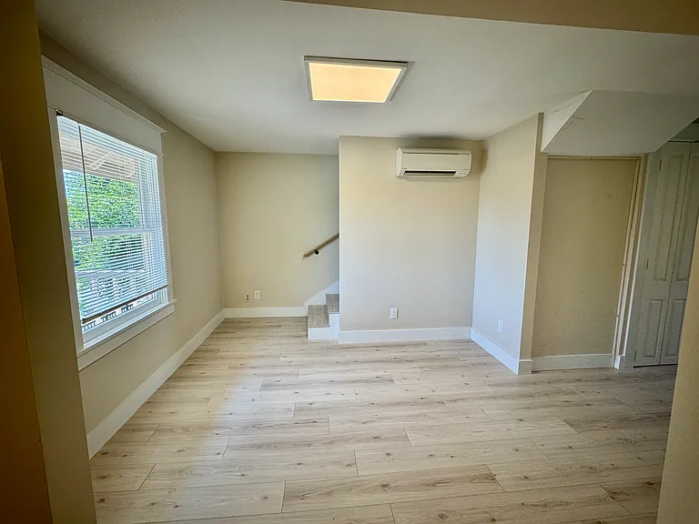 Living room and staircase to the top floor