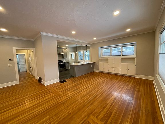 Built-ins cabinets in dining area plus breakfast bar